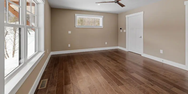 Luxury vinyl plank flooring installation in a finished living room